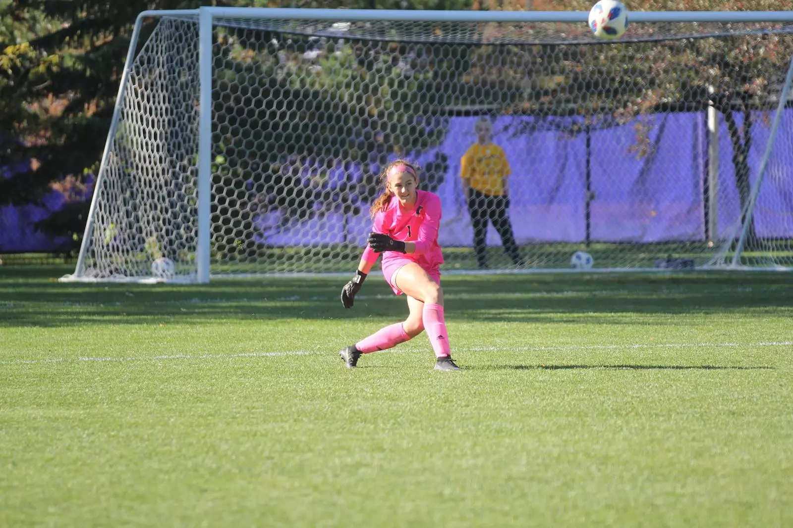 Senior goalkeeper Tayler Koop kicking the ball on a goal kick
