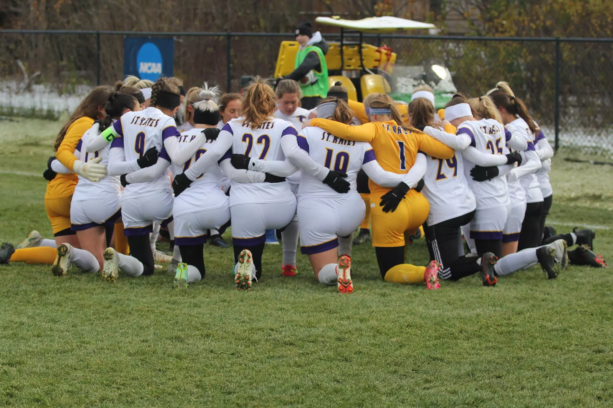 St. Catherine soccer huddle