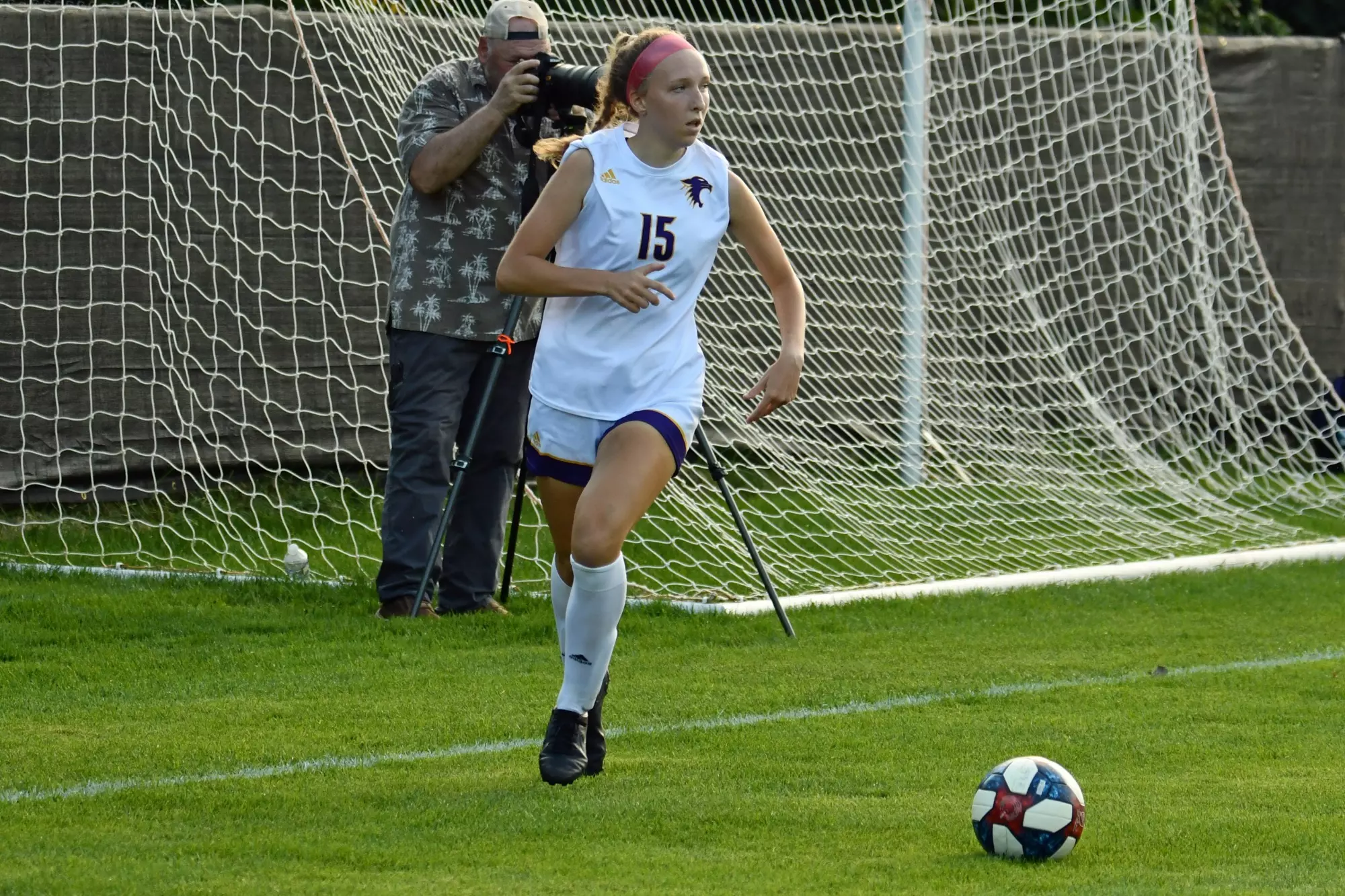 Natalie Pfleger kicking soccer ball