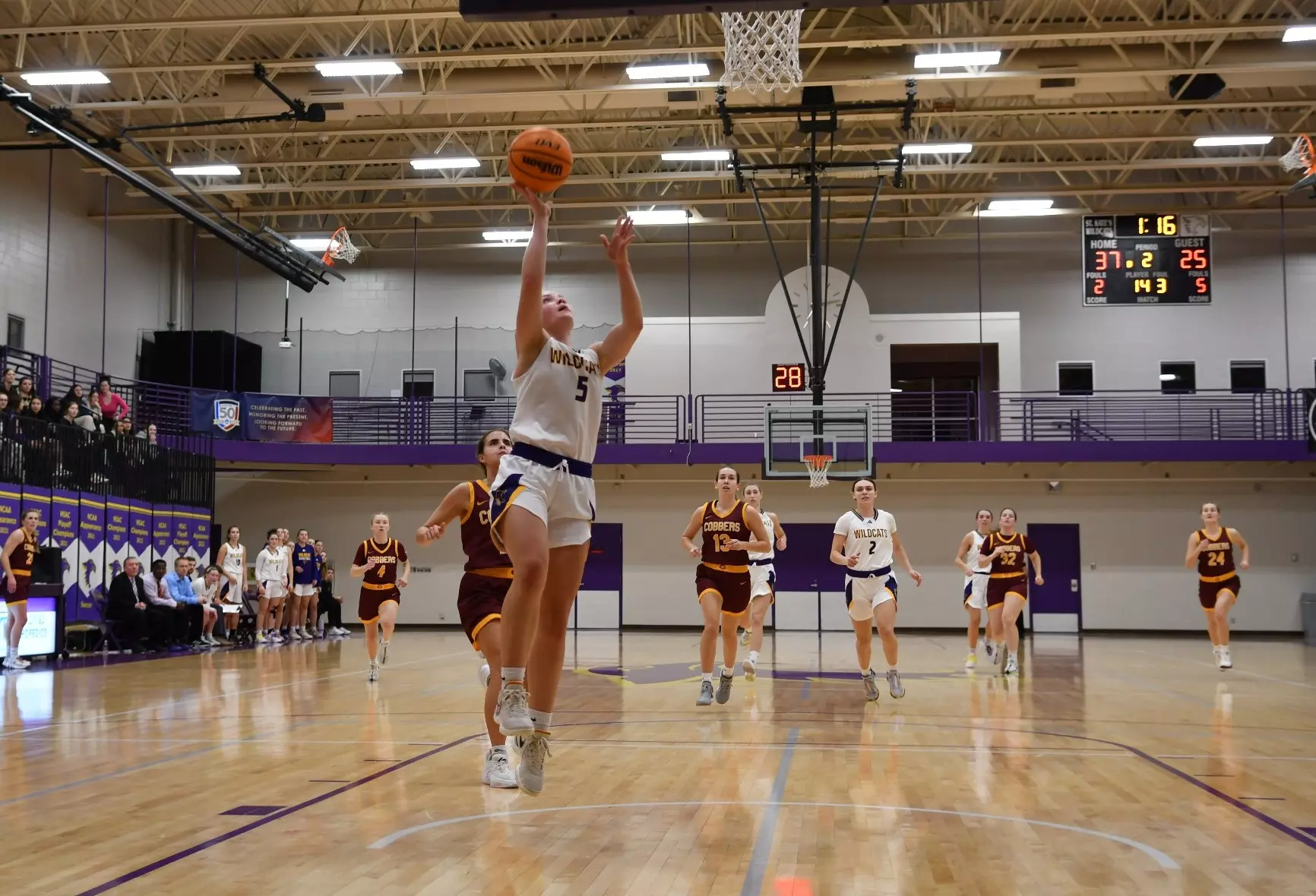 Hattie Fox making lay up at Butler Center