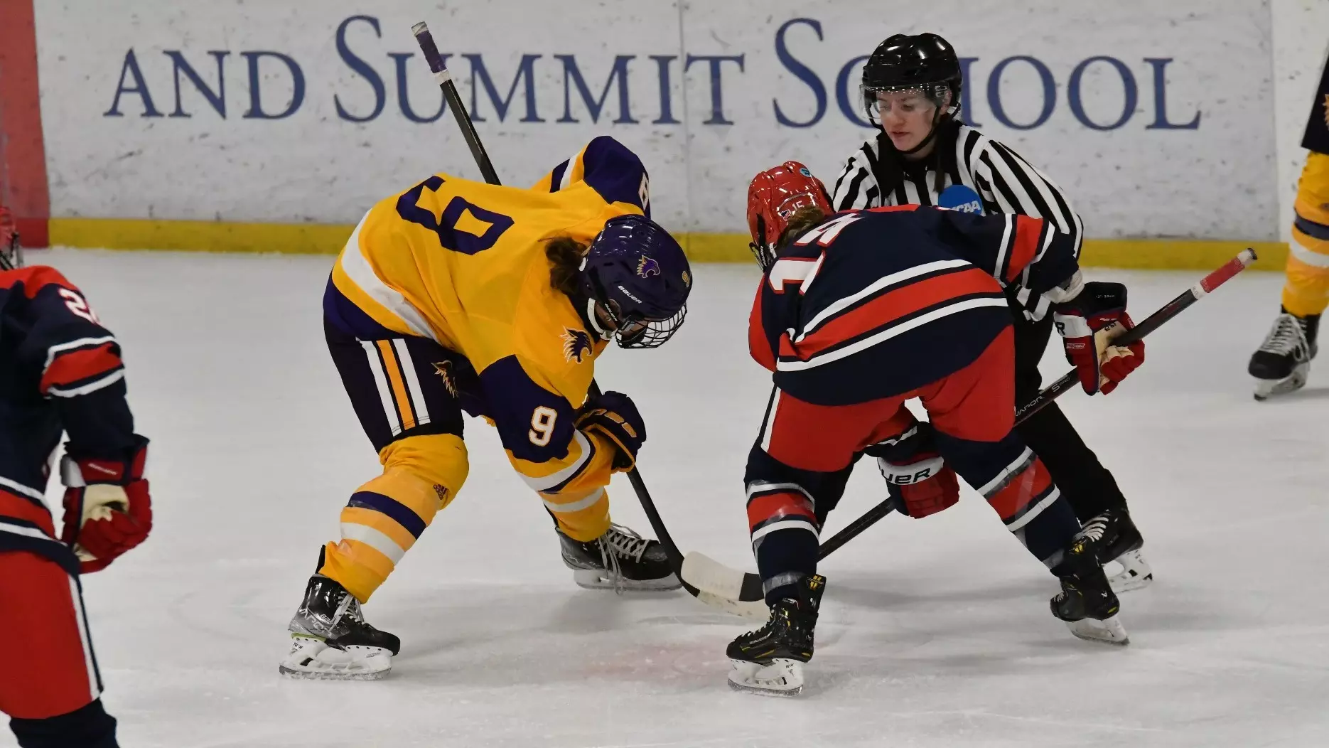 Julia Wilson face off against Saint Mary