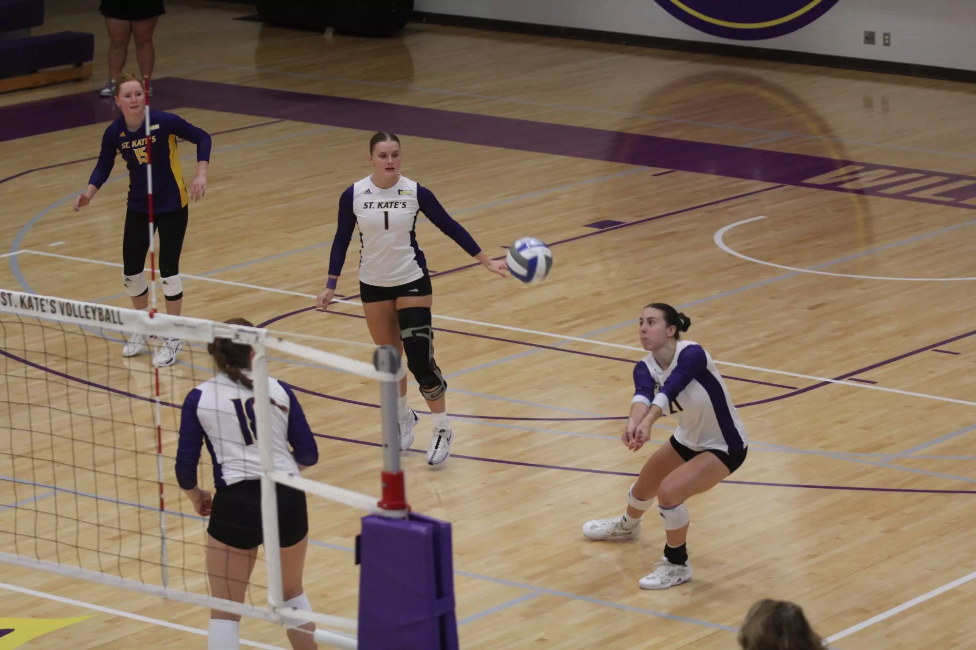 Lexie Petrick digging ball 