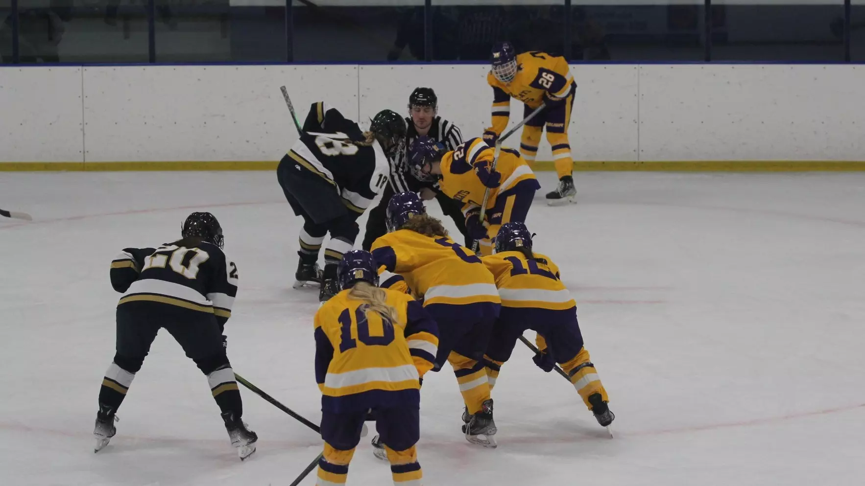 Hockey team lining up for faceoff