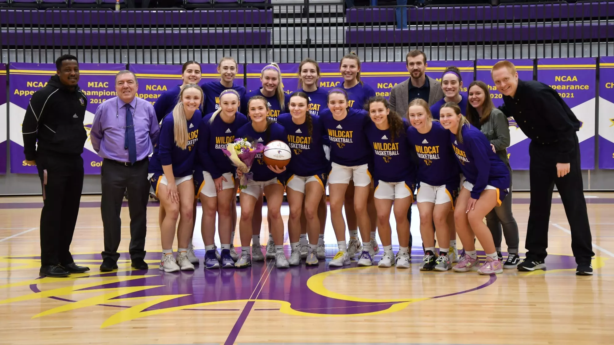 Karis Zezza senior day with entire team plus coaches