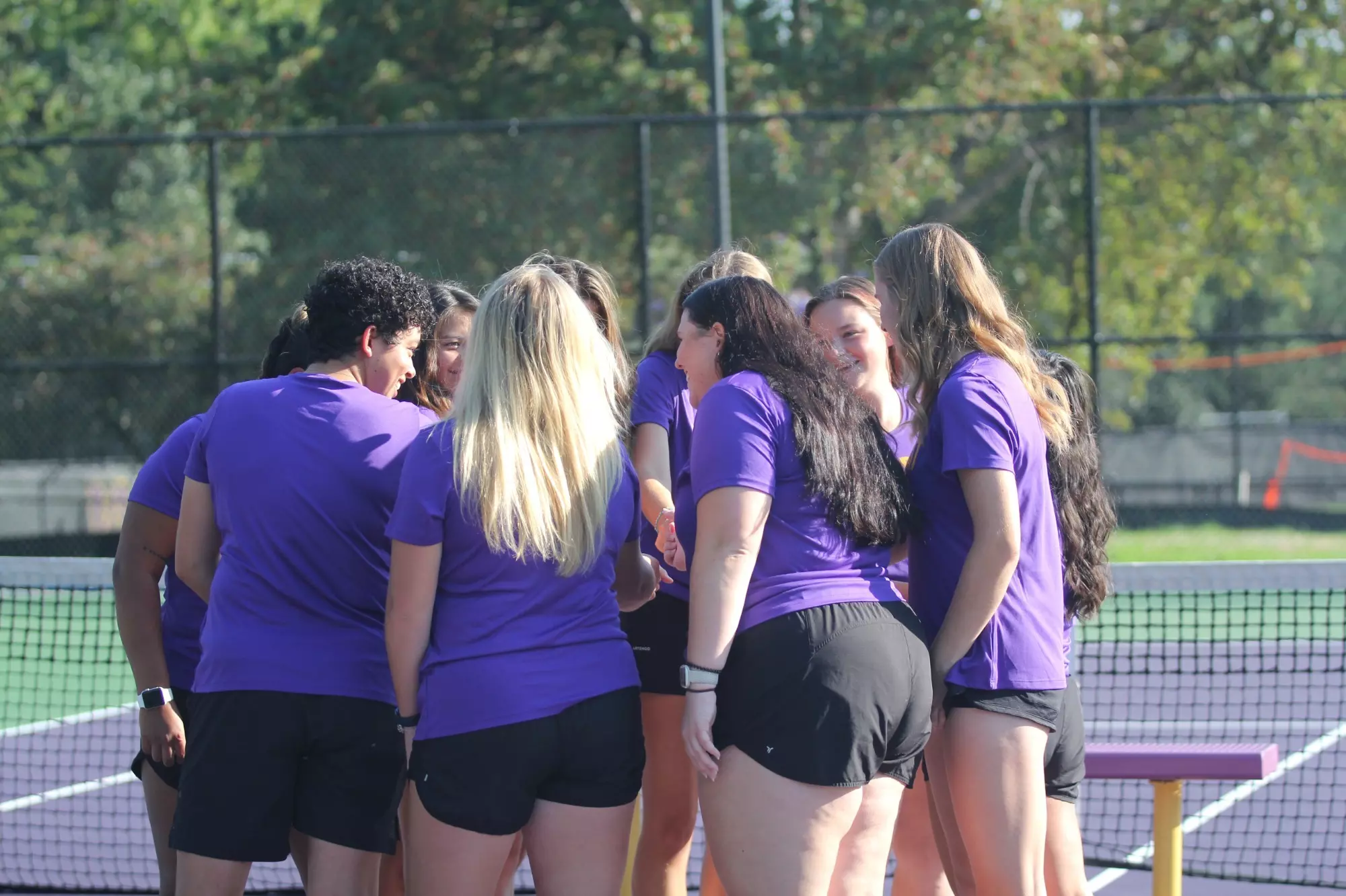 Tennis team huddle