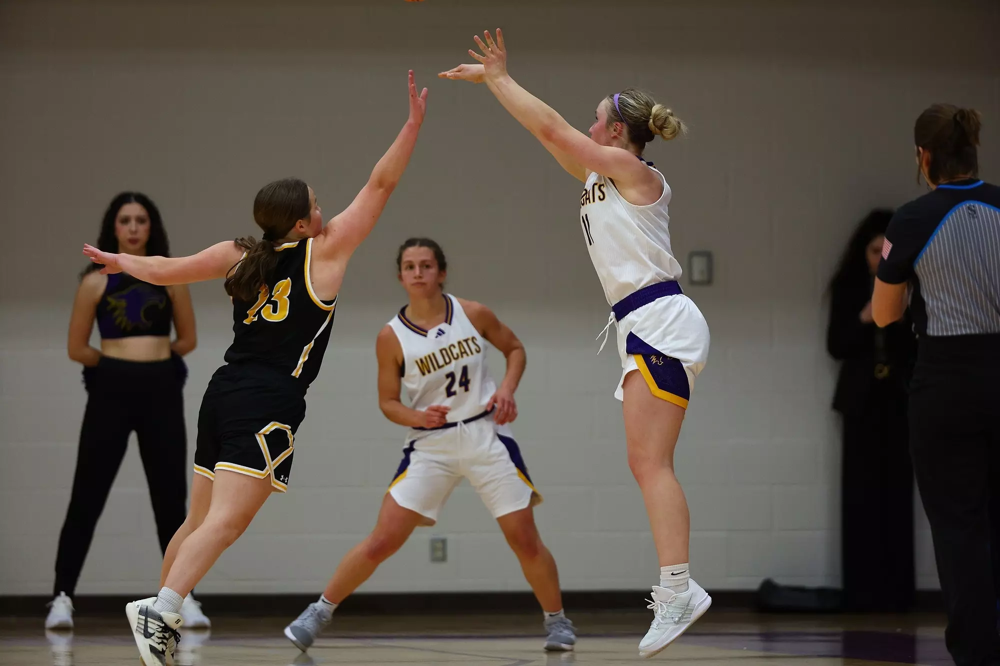Hattie Fox shooting three 