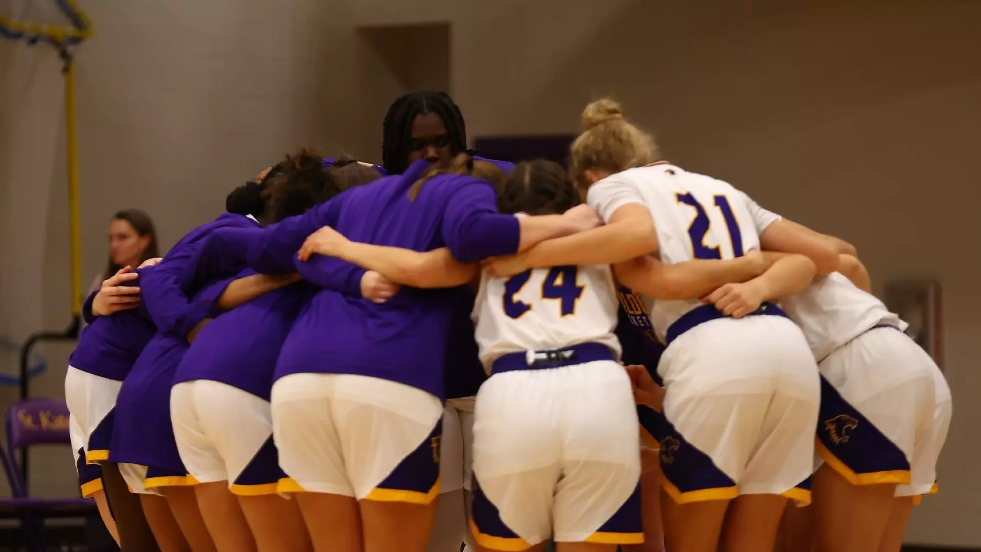 Basketball team huddle