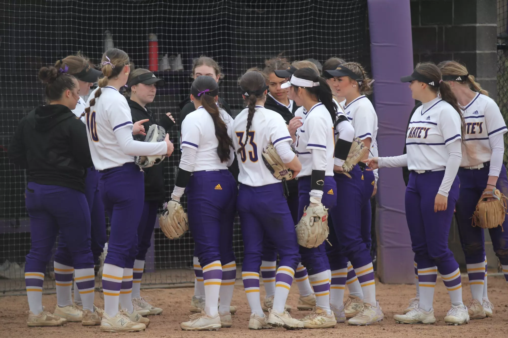 Softball team huddle