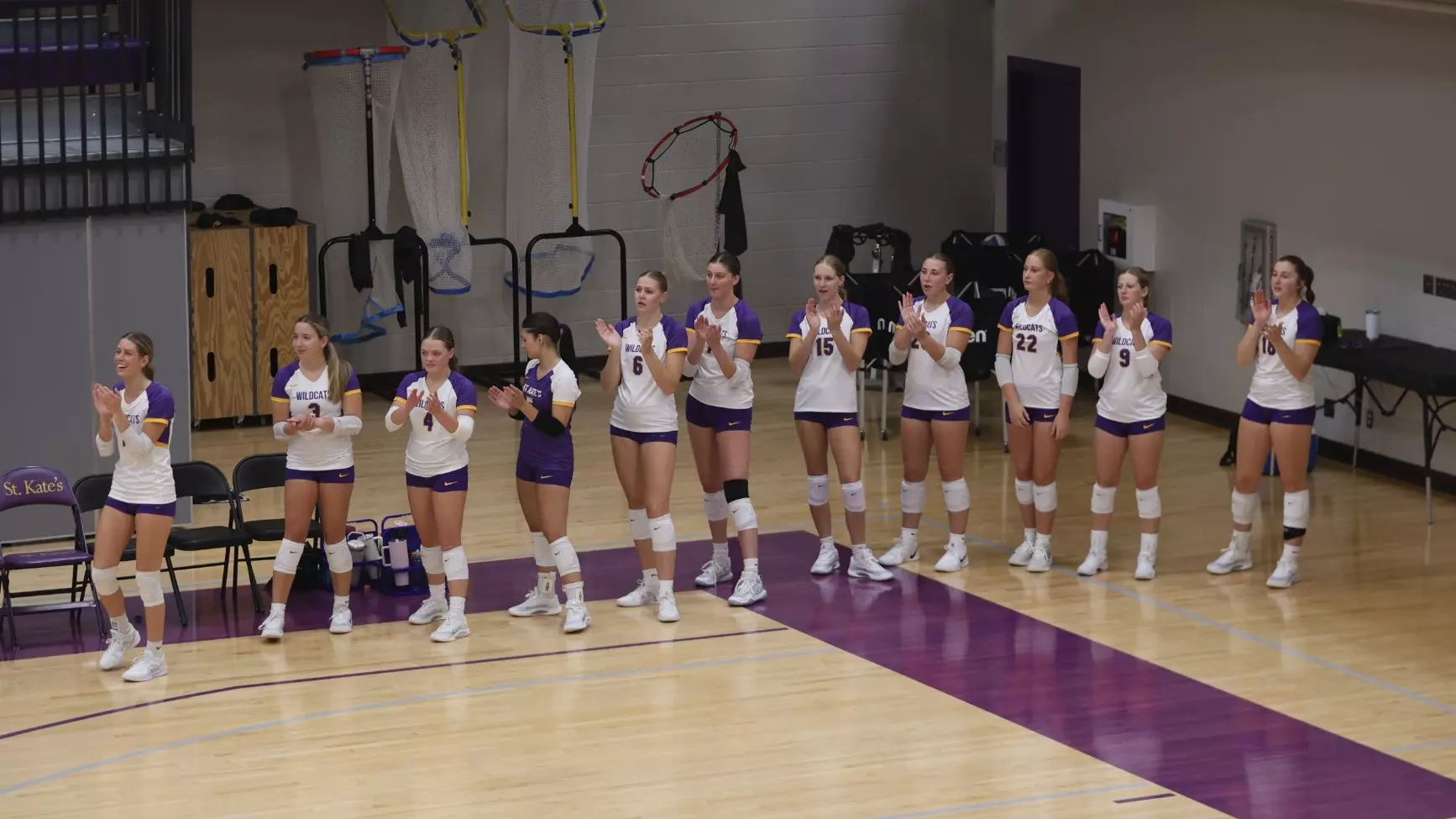 Volleyball team on sideline