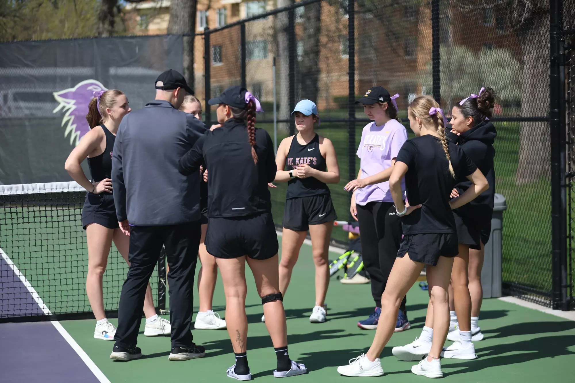 Tennis team huddle