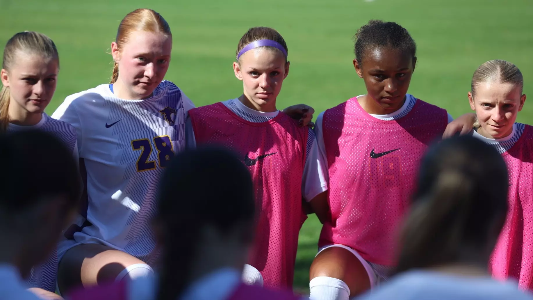 Soccer team pregame huddle