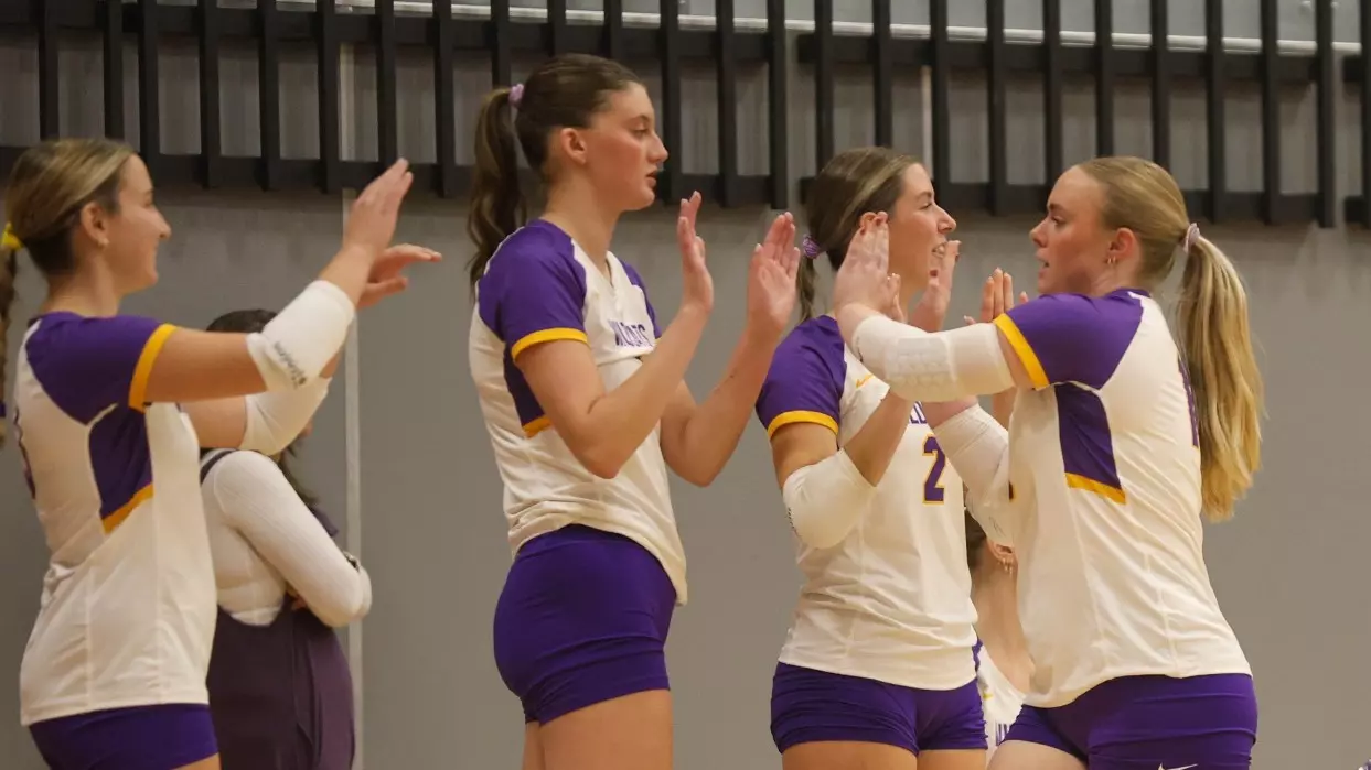 volleyball team celebrating