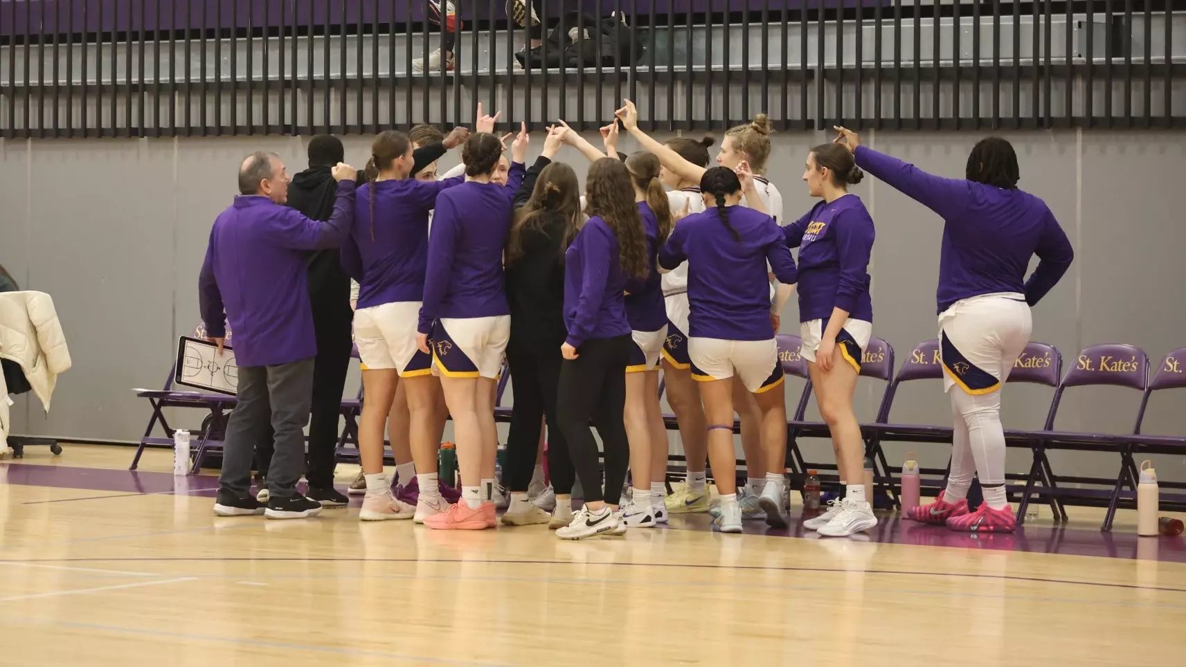 Basketball team huddle 