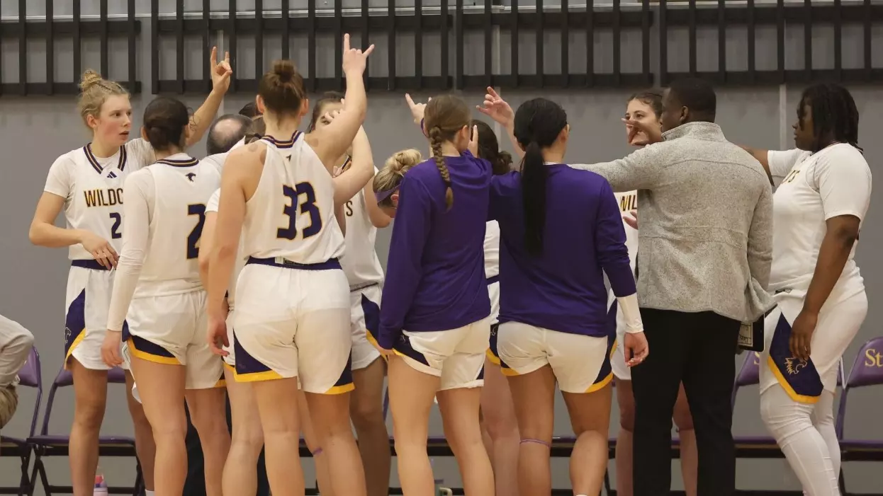 Basketball team huddle